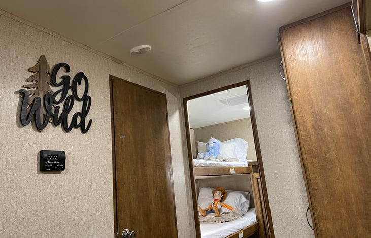 Entrance to 4 bunkbed room and convertible activity table with benches.