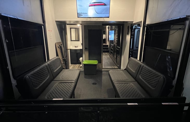 11 ft garage with 2 queen beds 1/2 bath tv and mini fridge.