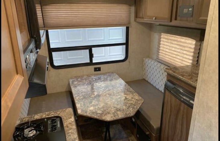 Dinette - table folds down to make bed