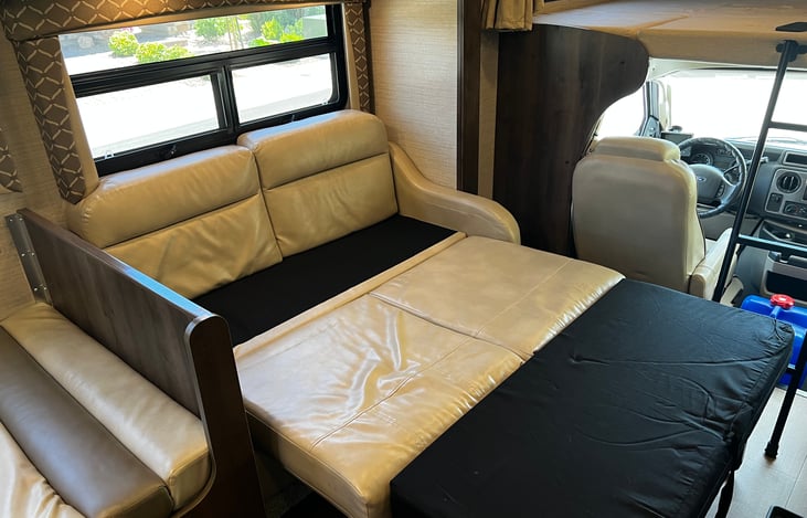 Sofa turned to sleeping area.