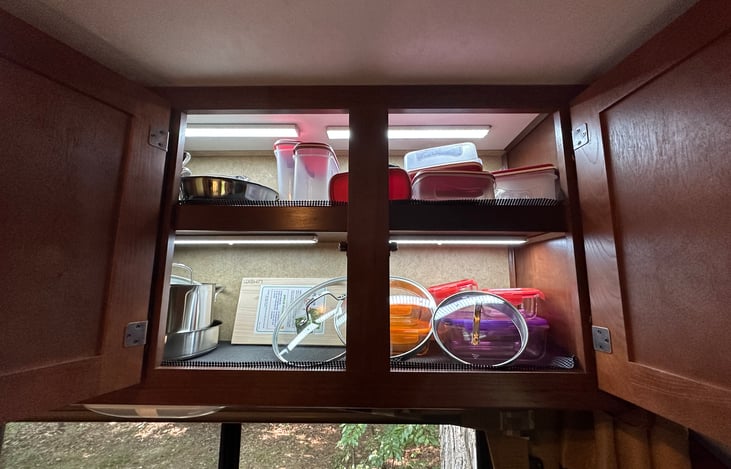 Over the dinette cabinets with kitchen utensils