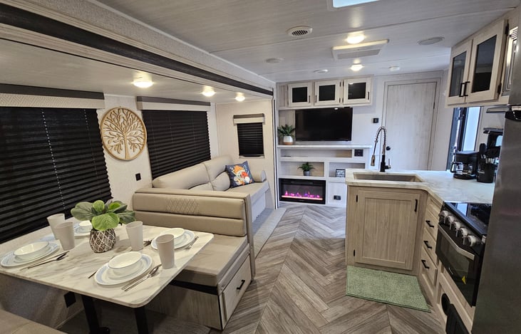 Living area with convertible sofa and dinette