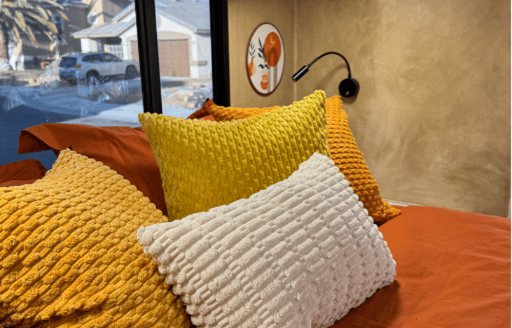 Primary bedroom has full queen and USB charge port under bedside light