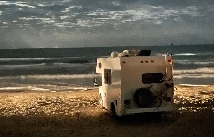 Sout Padre Island allows parking on the beach. You can sleep windows open listening to the wawes.