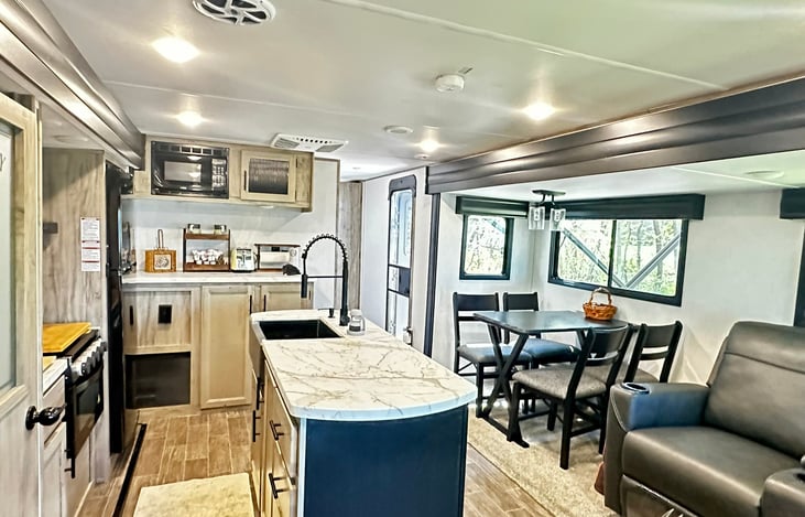 Very well equipped large kitchen area!  We provide basic condiments, coffee kcups and creamers, and basic kitchen function items.  If you need something, just ask!  We are on property.