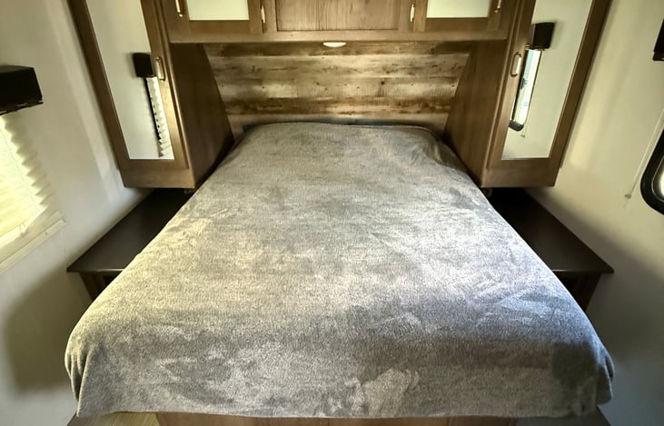 upgraded master bed with 12" memory foam mattress