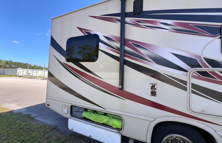 Great storage outside, but one cabinets stocked with chairs!