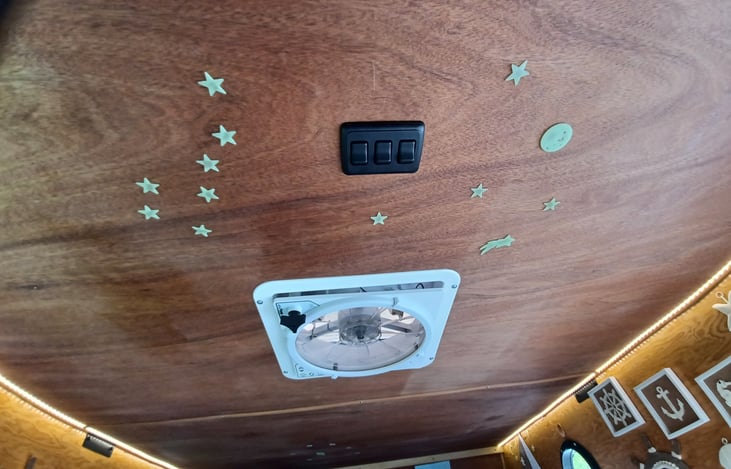 10-speed, two-way fan keeps air moving and trailer cool in the nights. Glow in the dark stars and planets make kids feel secure in the dark.