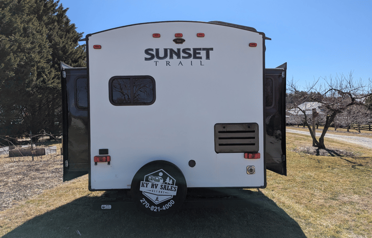 Luxury 30' triple-slide trailer with a gourmet rear kitchen & private master suite. Massive open-concept living and theater seating—the ultimate upscale home on wheels for your next getaway!