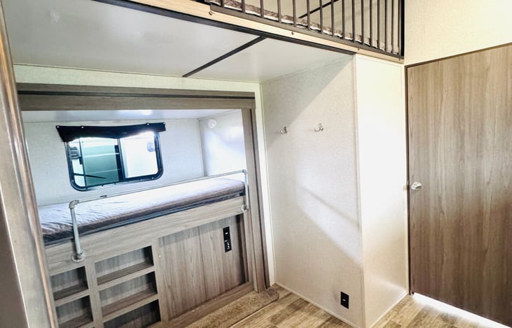 2nd Private Room perfect for kids (sleeps 5-6). Lower bunk (sleeps 1); Overhead bunk (sleeps 2); Lower sofa couch (sleeps 1-2); Upper bunk (sleeps1)