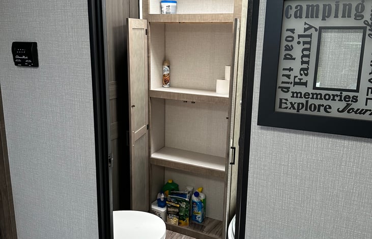 Bathroom linen and toiletry closet