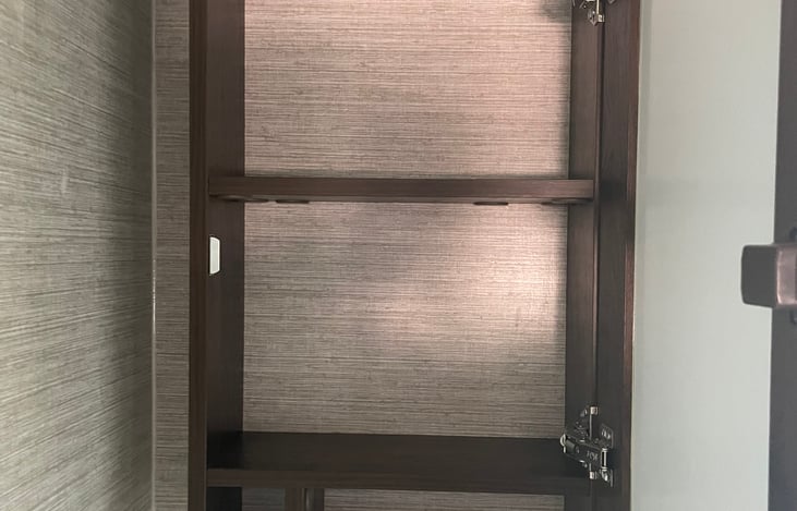 Inside of medicine cabinet.