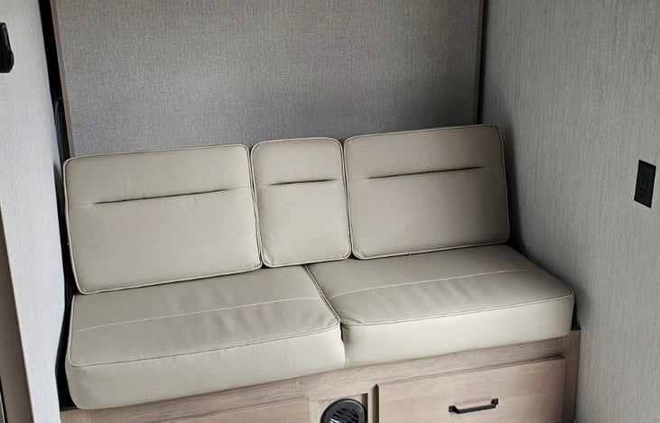 Convertible sofa with overhead storage