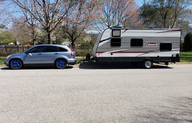 Tows ok with my CRV, though I recommend something more powerful.  The weight distribution hitch is awesome.