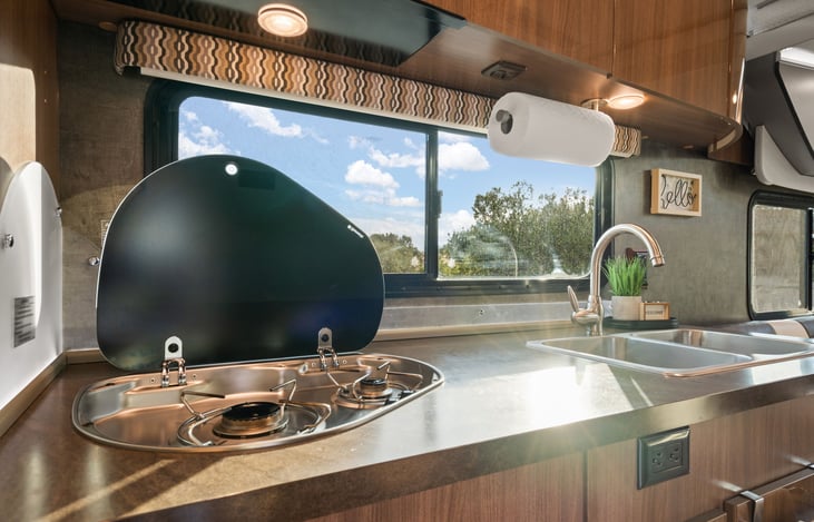 2 burner propane stove and kitchen sink with hot/cold water