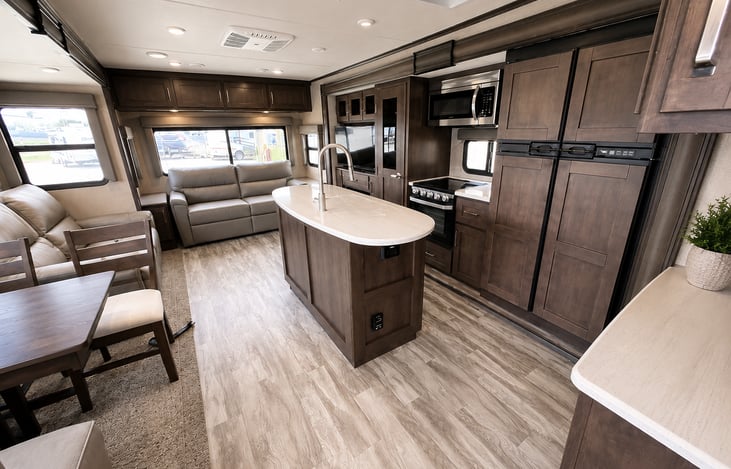 Spacious kitchen, dining, and living area