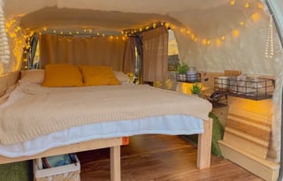 The Timber Den — Cozy Cabin Camper with Solar