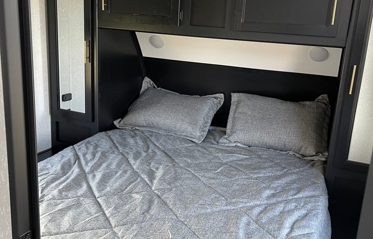 Queen bed with a 3” memory foam topper