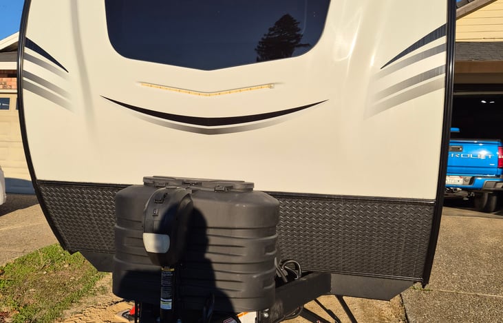 Two propane tanks with automatic switch.  If one tank goes empty it will switch to the full one automatically.