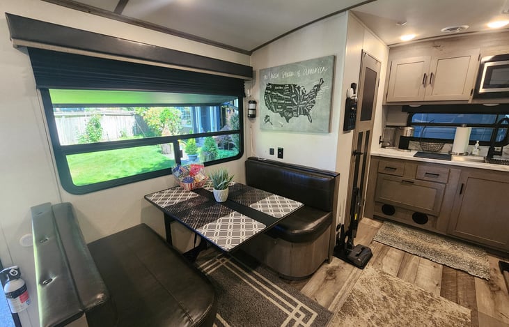 Dinette seats 4. There is extra seating for 2 at the recliners.