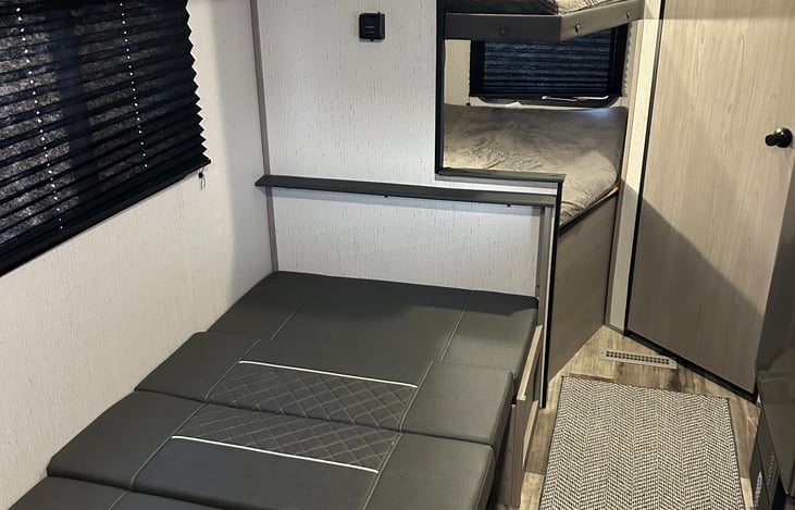 Dining table folds down into a daybed