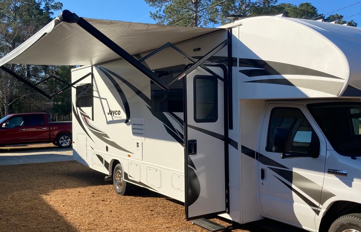 Large awning with lights and outdoor speaker