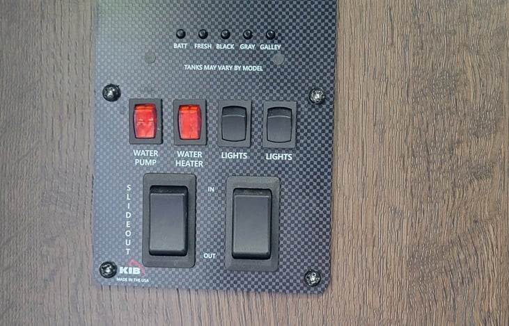 Tank level, battery charge indicator and slide out controls.