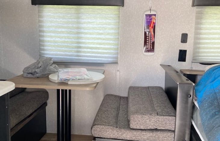 Dinette seats four - converts to bed for kiddos.