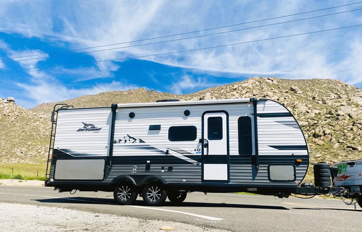Jam Caravan in its element — this Jayco Jay Flight is built for mountain escapes. Enjoy your trailer, enjoy the road.