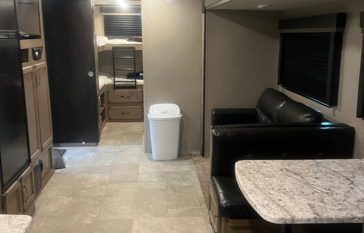 View from Master Bath into Main living area and rear bunkhouse