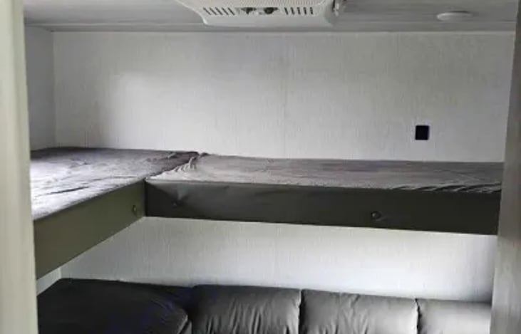 Bunkhouse with 3 bunk and sofa that folds down for an additional bed