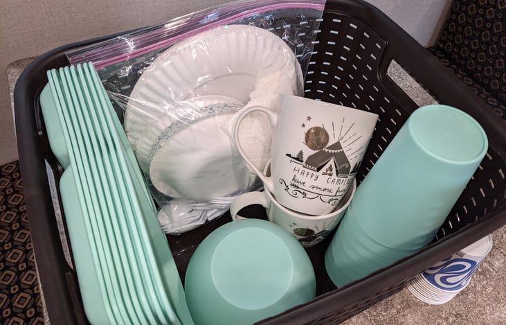 Picnic pack of 8 paper plates, bowls, cups, spoons, and forks provided.