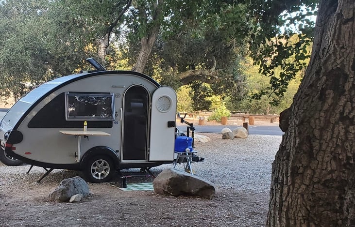 Relaxing at local wooded campsite