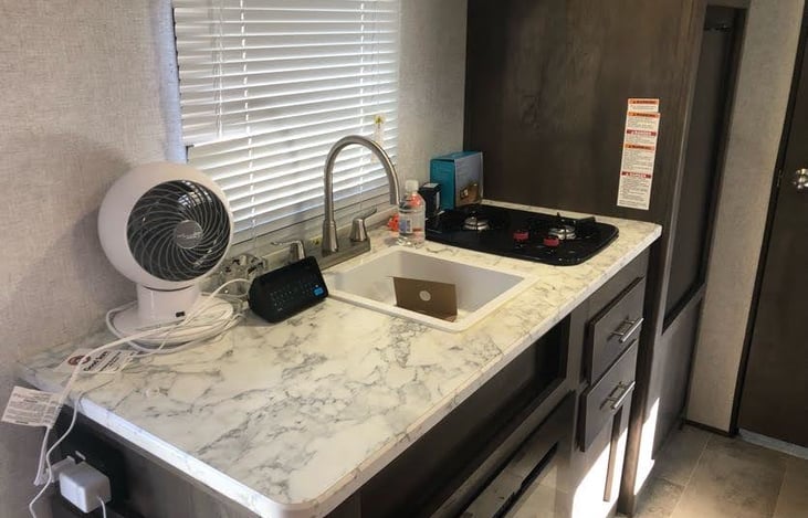 Kitchen area with directional fan included!