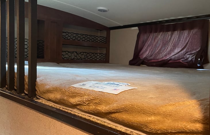 Above bunk room is loft, can easily hold 3 children.