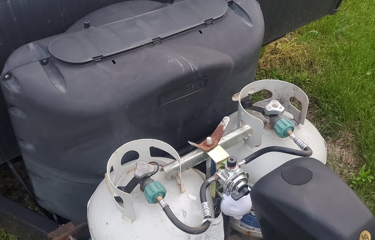 Tongue jack is power with led lights.
2-20# propane tanks for heat, cooking hot water and/or propane grill. Hot water is also electric.