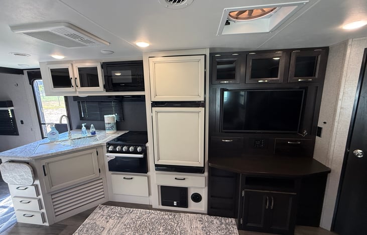 Entertainment center with TV and a lot of storage