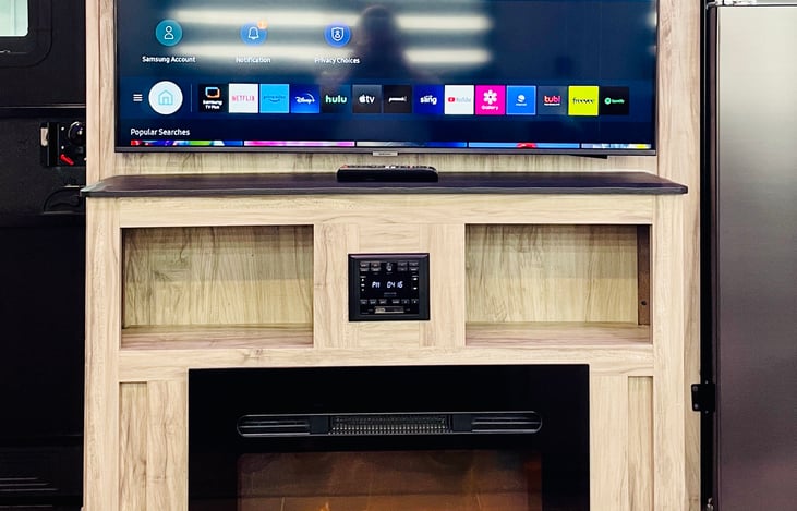 Entertainment system (Smart TV/AM/FM/Bluetooth/Aux/USB/HDMI) inside & outside speakers with 8” Ceiling Mounted, 200W Subwoofer. High Capacity Electric Fireplace (5200 BTU’s) with Multiple Heat