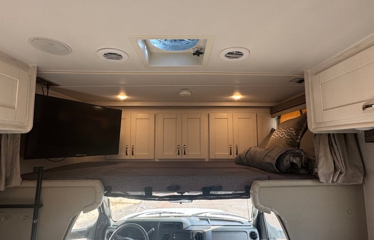 Over cab beds for extra sleeping if needed with privacy curtain and safety stop so you don’t roll off