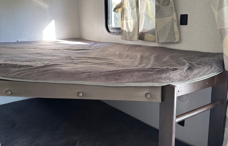 Double bunks- larger than a full but slightly smaller than a queen. Sleeps 4 total