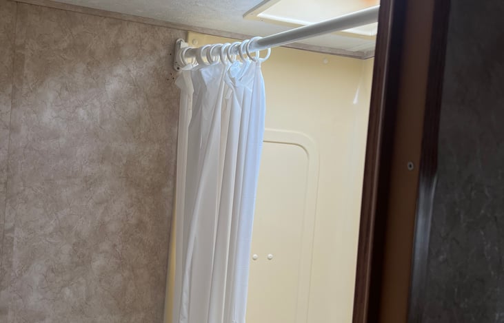 Master bath leading into master bedroom