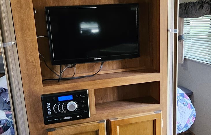 DVD player, radio, and bluetooth.