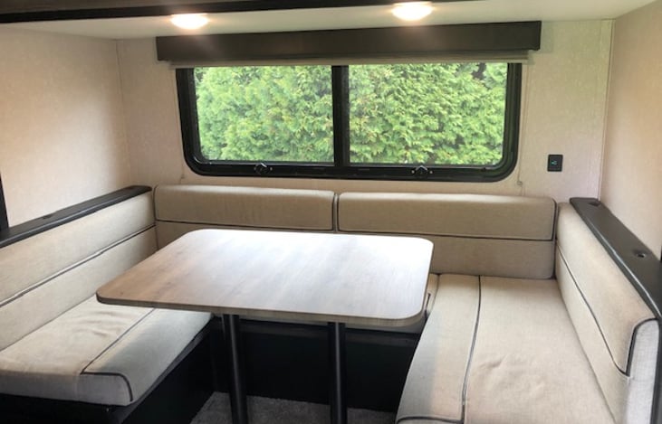 Dinette, seats 6 and folds down to a full size bed.