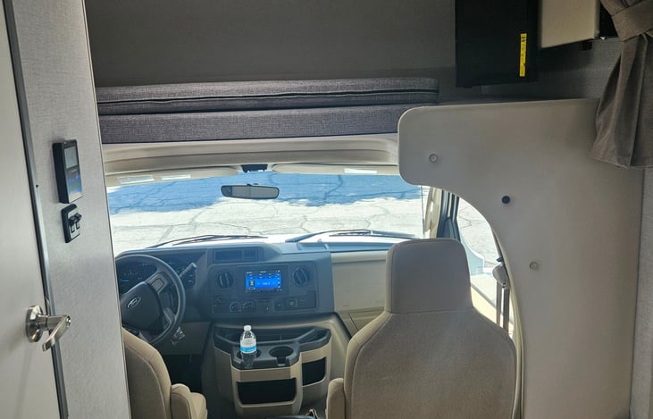 front view with overhead bed (Queen)