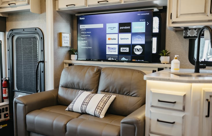 50 inch TV rises electronically with the touch of a button