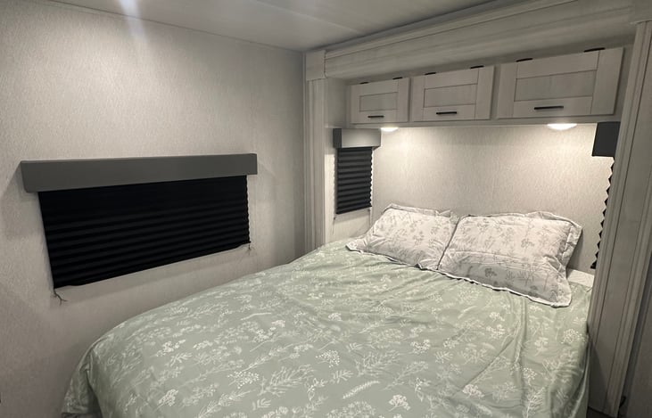 Memory foam topper queen bed in private bedroom with door and your own TV.