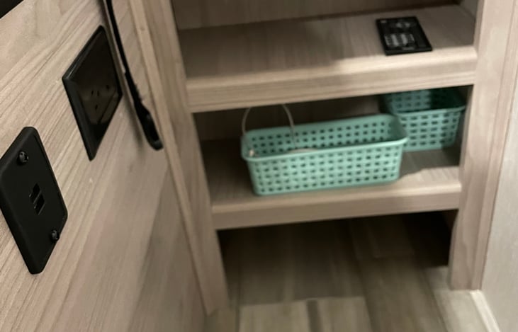 The right side of the bed has 2 shelves, 2 USB ports and an electrical outlet.