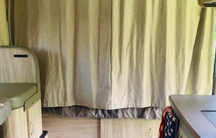 Full size bed with privacy curtain - linens provided