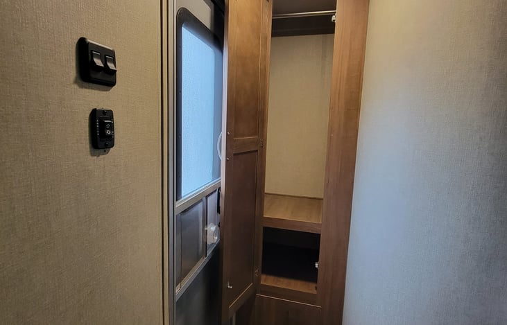 Entry door and closet.