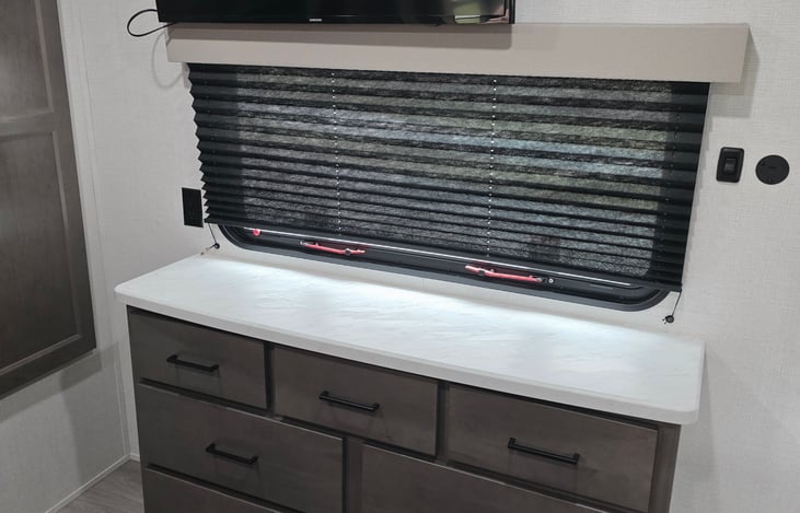 Master Bedroom - Dresser with Window and TV above